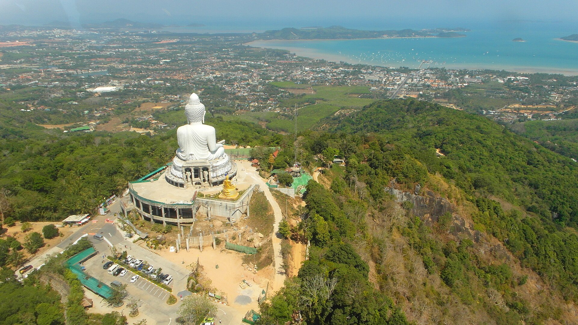 Aerial view of the Big Buddha on Nakkerd Hill above Phuket's coast
