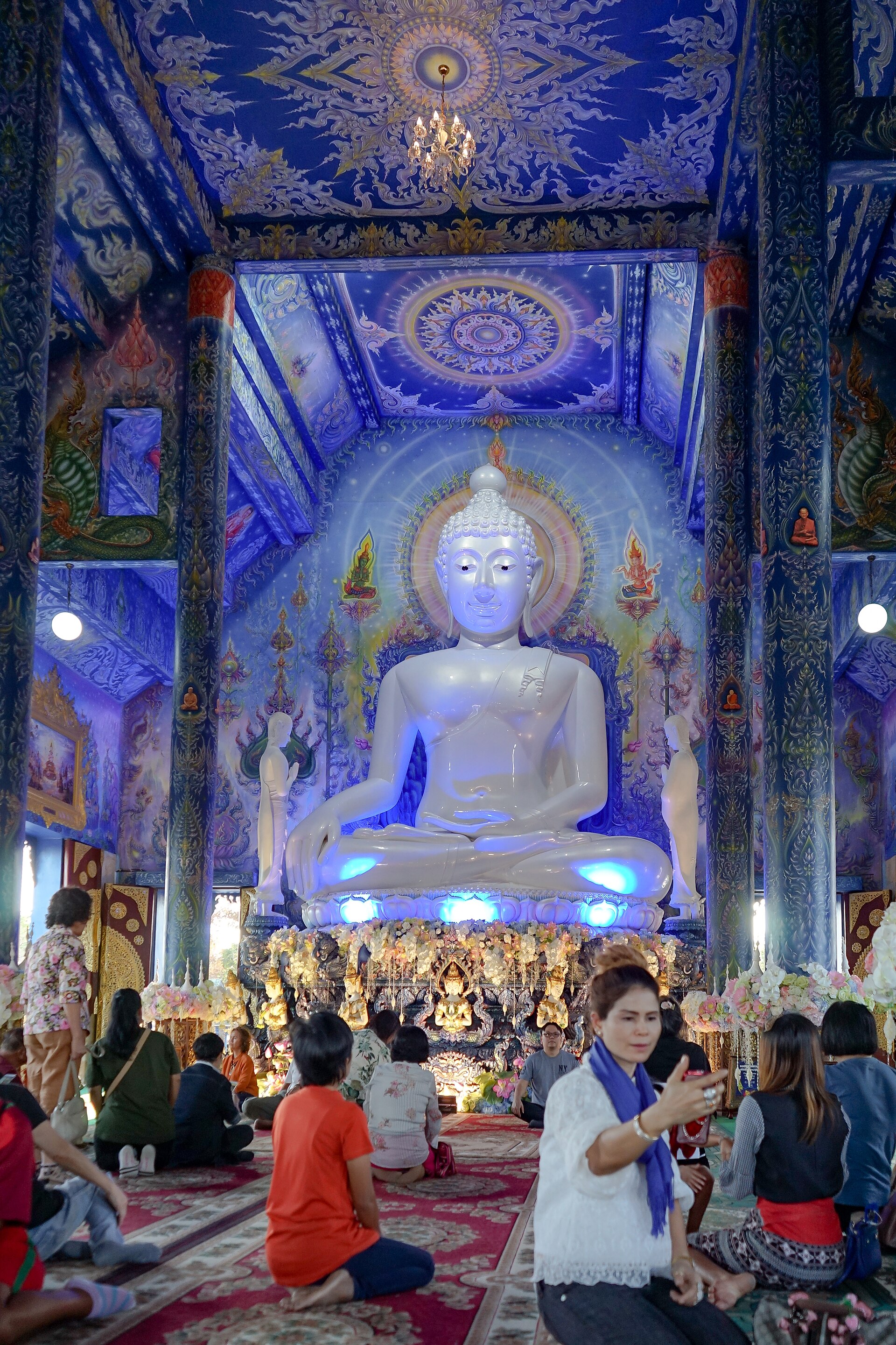 Pearl-white Buddha image inside the Blue Temple hall, Chiang Rai