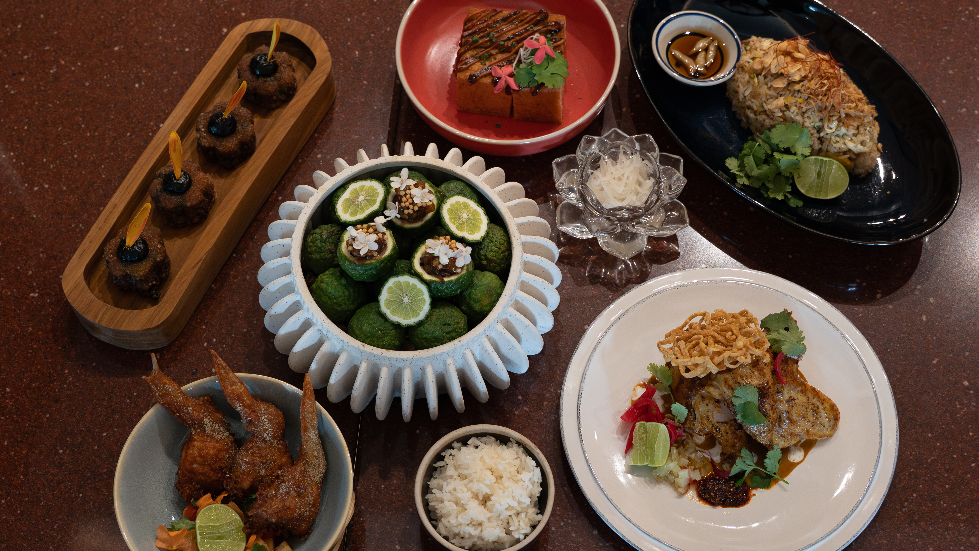 An overview of Sakkwa’s cuisine, showcasing a diverse selection of signature dishes from the restaurant.