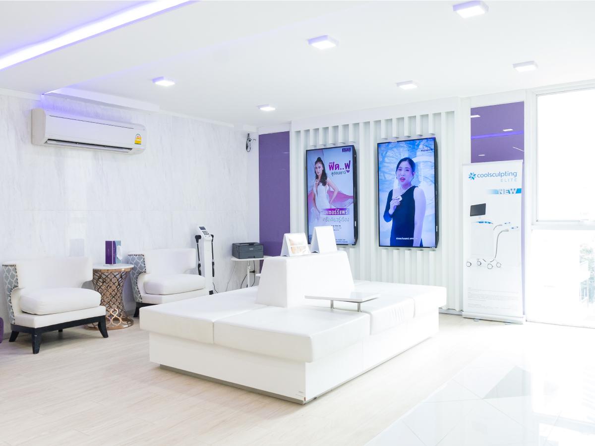 The grand interior design and spacious patient waiting area of Apex Medical Center.