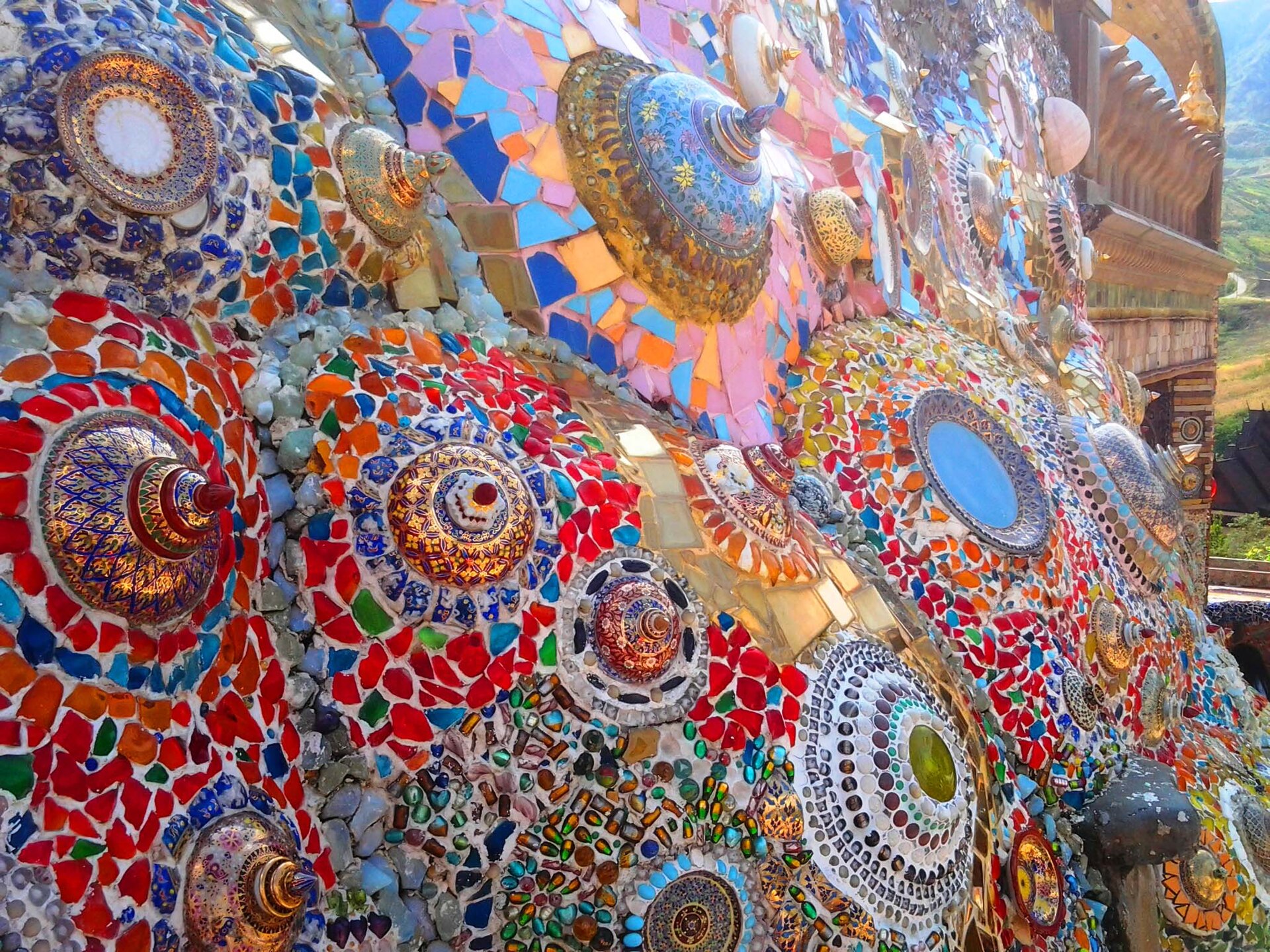 Close-up of ceramic mosaic decoration at Wat Pha Son Kaew
