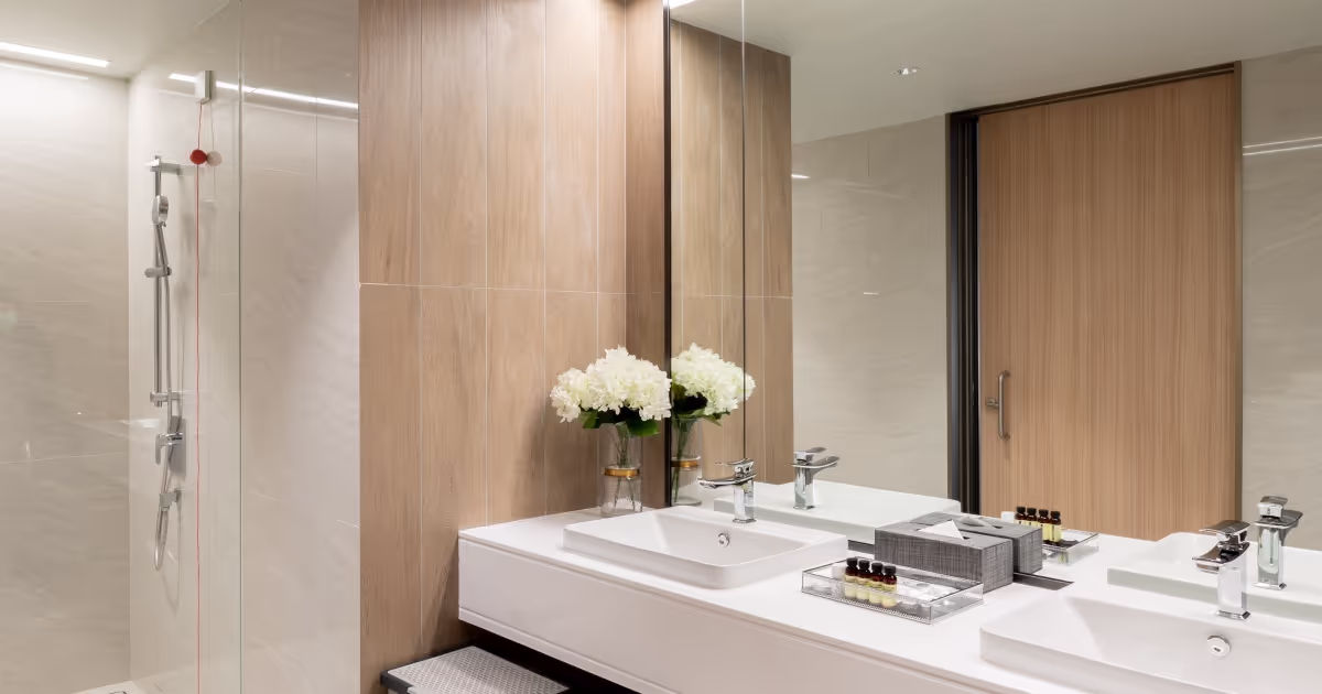 Luxurious Royal River Suite bedroom at MedPark Hospital with panoramic river views.