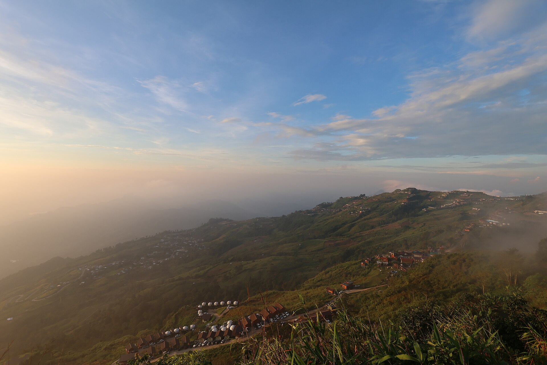 Late afternoon light over the ridges of Phu Thap Boek