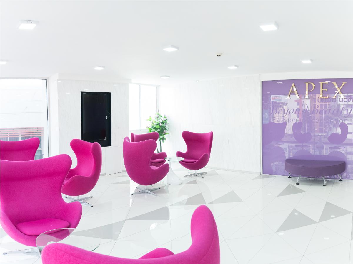 Elegant and luxurious reception lobby at Apex Medical Center with high ceilings and premium decor.