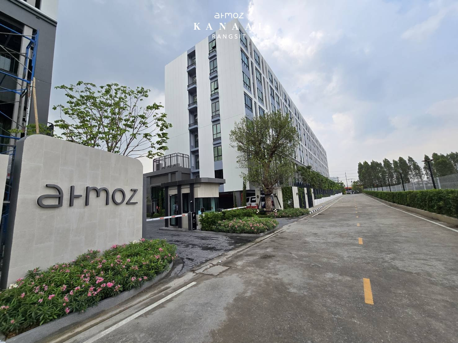 Entrance sign and building at Atmoz Kanaal Rangsit