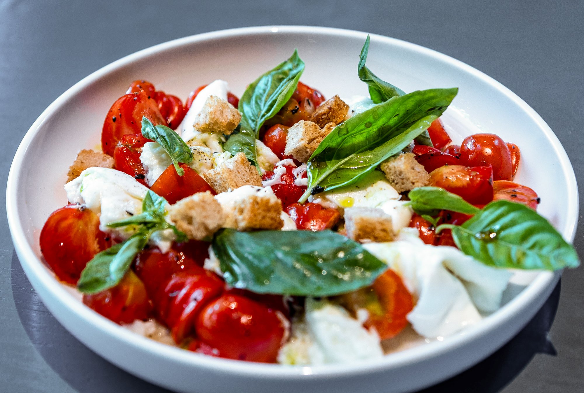 Truffle Honey Caprese with mozzarella, tomatoes and basil at Pal Cafe & Bistro