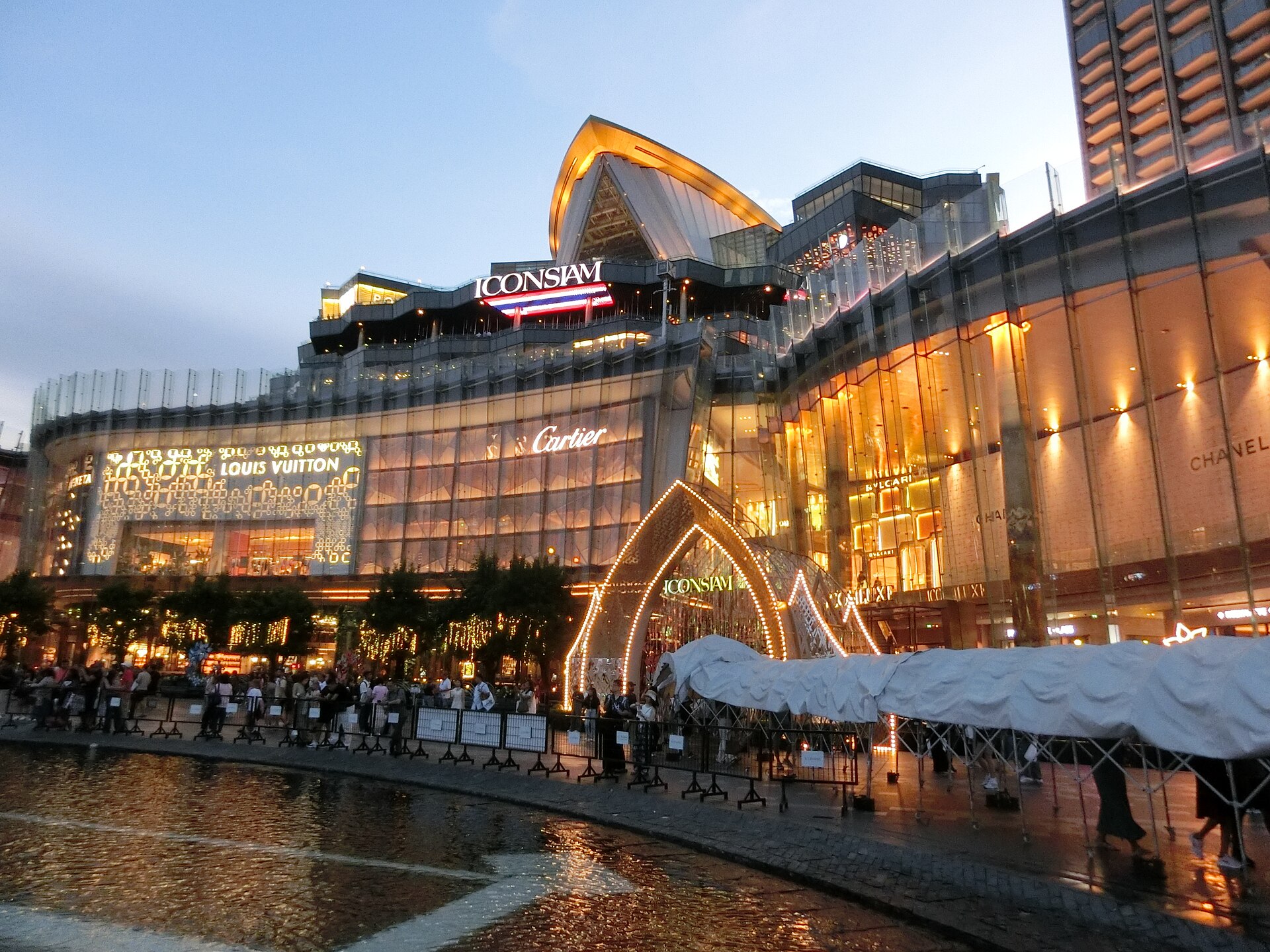 ICONSIAM shopping mall on the Chao Phraya River at twilight, Bangkok